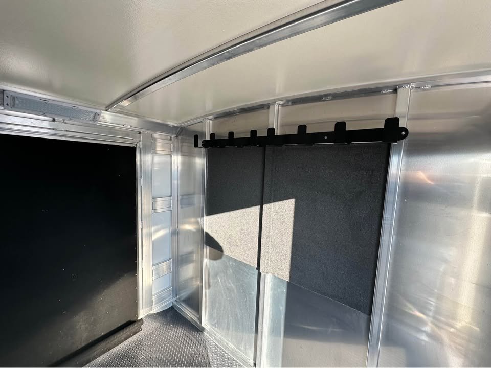 The spacious gooseneck nose area provides ample storage for ranch gear and equipment.